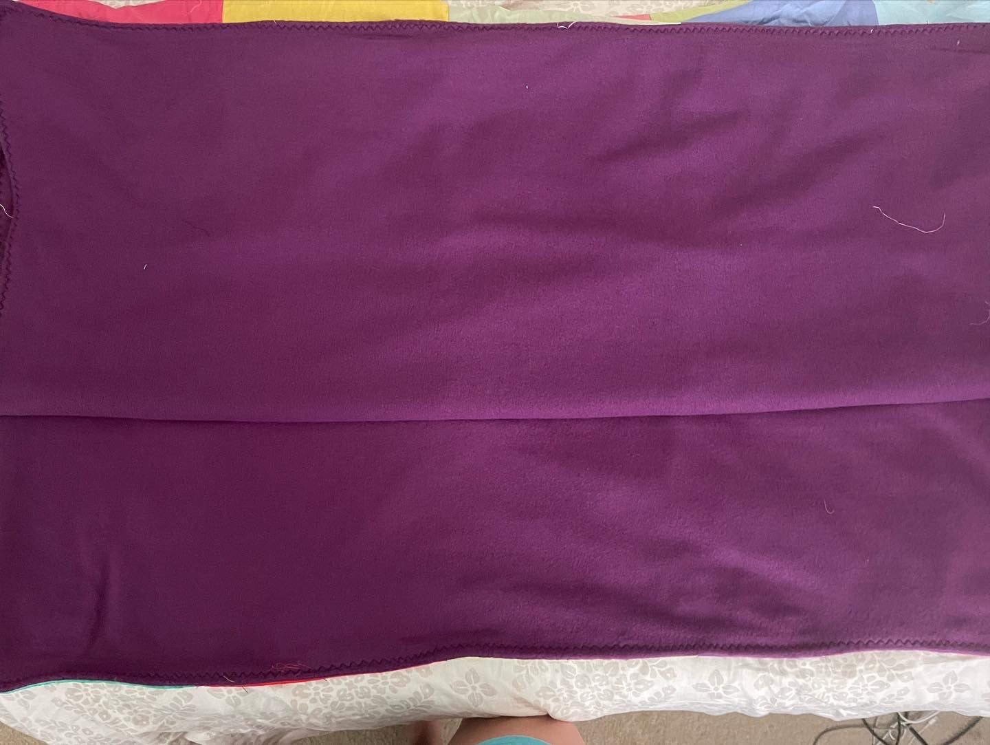 THE QUILT OF MANY COLORS