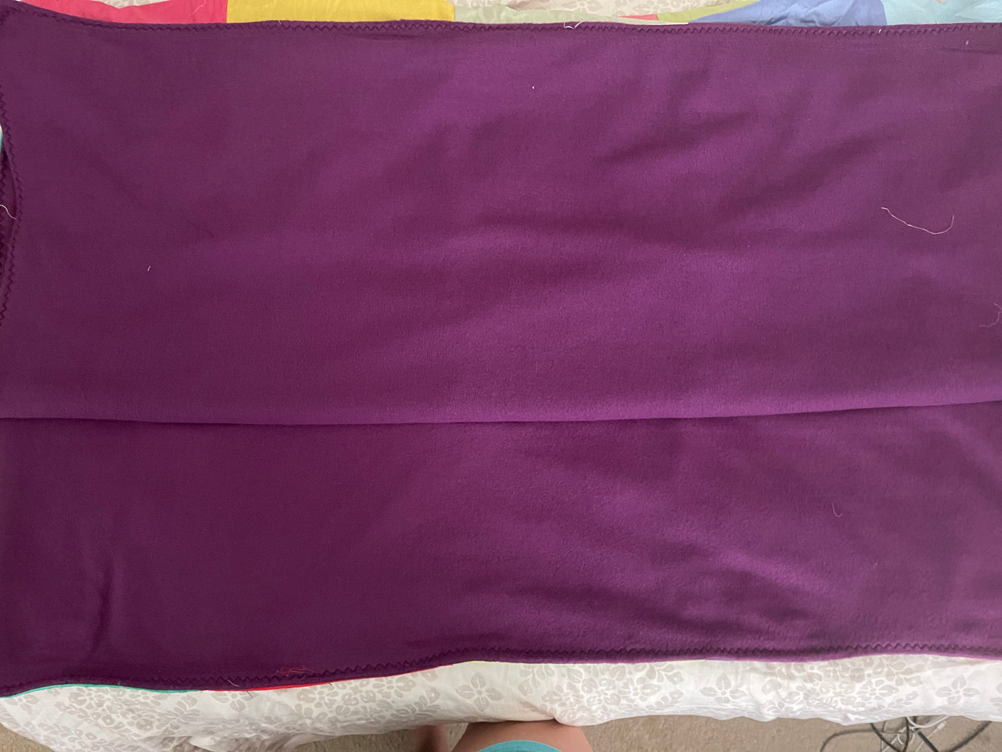 THE QUILT OF MANY COLORS